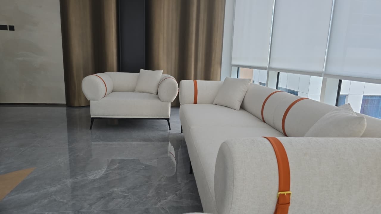 custom sofa set in a modern room with sculpted timber wall cladding